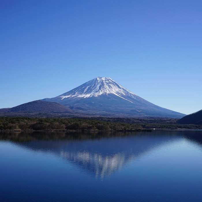 Mt. Fuji reflected in lake at sunrise